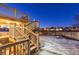 Back deck with stairs and a view of the backyard at 13363 Cherry Ct, Thornton, CO 80241