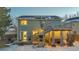 Two-story house with solar panels, deck and hot tub at 13363 Cherry Ct, Thornton, CO 80241