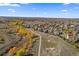 Panoramic aerial view showcasing the community's layout, foliage and walking paths at 12062 Song Bird Hills St, Parker, CO 80138