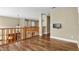 Hallway view from the second floor, featuring hardwood floors and views of the staircase at 2384 Crestridge Dr, Castle Rock, CO 80104