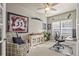 Bright home office with built-in shelving and large windows at 2384 Crestridge Dr, Castle Rock, CO 80104