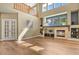Spacious living room featuring hardwood floors and a fireplace with natural light at 2384 Crestridge Dr, Castle Rock, CO 80104