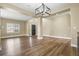 Large open concept living room featuring wood flooring and neutral color palette at 2384 Crestridge Dr, Castle Rock, CO 80104