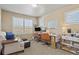 This home office is equipped with dual monitors, comfortable seating, and natural light at 2384 Crestridge Dr, Castle Rock, CO 80104
