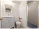 Clean basement bathroom with shower and vanity at 1673 S Fulton St, Aurora, CO 80247