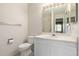 Clean bathroom with vanity and shower/tub combo at 1673 S Fulton St, Aurora, CO 80247