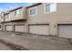 Row of attached garages with individual doors at 1673 S Fulton St, Aurora, CO 80247