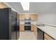 View of kitchen with stainless steel appliances at 1673 S Fulton St, Aurora, CO 80247