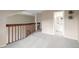 Upstairs hallway with access to bathroom and bedroom at 1673 S Fulton St, Aurora, CO 80247