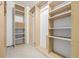 Large walk-in closet with shelving and hanging rods at 1673 S Fulton St, Aurora, CO 80247