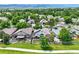 Charming home with well-manicured lawn, inviting back patio, and picturesque neighborhood setting, perfect for serene living at 6776 Salvia Ct, Arvada, CO 80007
