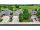 Charming home with lush greenery, well-manicured landscaping, and a convenient driveway, situated in a peaceful neighborhood setting at 6776 Salvia Ct, Arvada, CO 80007