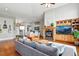 Spacious living room with hardwood floors and a fireplace, perfect for entertaining at 6776 Salvia Ct, Arvada, CO 80007