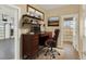 Home office with built-in shelving and desk at 767 S Main St, Byers, CO 80103