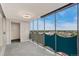 Balcony overlooking a tree-filled cityscape at 1155 N Ash St # 1206, Denver, CO 80220
