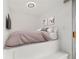 Bedroom featuring a raised bed area and unique architectural details at 1155 N Ash St # 1206, Denver, CO 80220