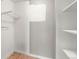 Walk-in closet with shelving and rods at 1155 N Ash St # 1206, Denver, CO 80220