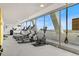 Gym features treadmills, elliptical machines, and large windows with natural light at 1155 N Ash St # 1206, Denver, CO 80220