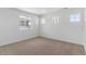 Empty bedroom with neutral carpet and three windows at 459 S Salida St, Aurora, CO 80017