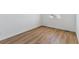 Bright bedroom with wood-look floors and a large window at 459 S Salida St, Aurora, CO 80017