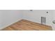 Empty laundry room with wood-look floors at 459 S Salida St, Aurora, CO 80017
