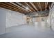 Large unfinished basement featuring exposed ceiling and insulated walls, ready for customization at 836 Sundance Ln, Erie, CO 80516