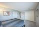 Bedroom with double closets for storage, carpet floors and neutral paint at 3331 S Monaco Pkwy # D, Denver, CO 80222