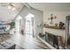 Bright living room featuring vaulted ceilings, fireplace, lots of natural light and sliding door to deck at 3331 S Monaco Pkwy # D, Denver, CO 80222