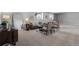 Finished basement with comfortable sitting area at 7033 S Waterloo Way, Aurora, CO 80016