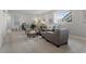 Finished basement recreation room with sitting area at 7033 S Waterloo Way, Aurora, CO 80016