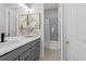 Bathroom with double vanity and shower/tub combo at 7033 S Waterloo Way, Aurora, CO 80016