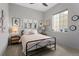 Charming bedroom with metal bed frame and decor at 7033 S Waterloo Way, Aurora, CO 80016