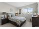 Bright and airy bedroom with window and ample closet space at 7033 S Waterloo Way, Aurora, CO 80016