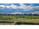 View of homes and green space in a new community at 7033 S Waterloo Way, Aurora, CO 80016