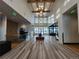 Bright and airy community lobby with high ceilings and modern chandelier at 7033 S Waterloo Way, Aurora, CO 80016
