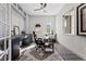Bright home office features built-in shelving and window seat at 7033 S Waterloo Way, Aurora, CO 80016