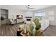 Living room with a fireplace and large sectional sofa at 7033 S Waterloo Way, Aurora, CO 80016