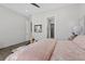 Main bedroom with floral bedding and sitting area at 7033 S Waterloo Way, Aurora, CO 80016