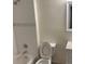 Bathroom with white tile, shower/tub combo, and vanity at 14141 E Jewell Ave # 102, Aurora, CO 80012