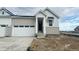 Charming single-Gathering home featuring brick accents, a two-car garage, and a welcoming front entrance at 3408 N Duquesne Way, Aurora, CO 80019