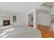 Spacious living room with fireplace and hardwood floors at 2660 S University Blvd # I, Denver, CO 80210