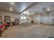 Spacious garage with two car garage door, lighting, storage, and plenty of open space at 89 Fairview Cir, Breckenridge, CO 80424