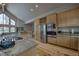 Spacious kitchen with granite counters, stainless steel appliances, and wine storage at 89 Fairview Cir, Breckenridge, CO 80424