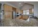 Kitchen with granite countertop, stainless steel appliances, and custom cabinets at 89 Fairview Cir, Breckenridge, CO 80424