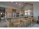 Kitchen with granite countertop, wooden cabinets, stainless steel appliances and breakfast bar at 89 Fairview Cir, Breckenridge, CO 80424