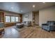 Spacious living room with a stylish couch, wooden table, and large window with view at 89 Fairview Cir, Breckenridge, CO 80424