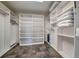 Walk-in closet featuring built-in shelving and ample storage space at 89 Fairview Cir, Breckenridge, CO 80424