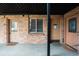 Up close exterior of two units showcasing door and window details, as well as the building's brick construction at 558 N Washington St # 103, Denver, CO 80203
