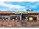 Exterior view of Don's Club Tavern showing a tile roof and vintage signage at 558 N Washington St # 103, Denver, CO 80203