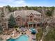 Aerial view of the property showcasing the pool, patio, and surrounding landscape at 5851 S Colorado Blvd, Greenwood Village, CO 80121